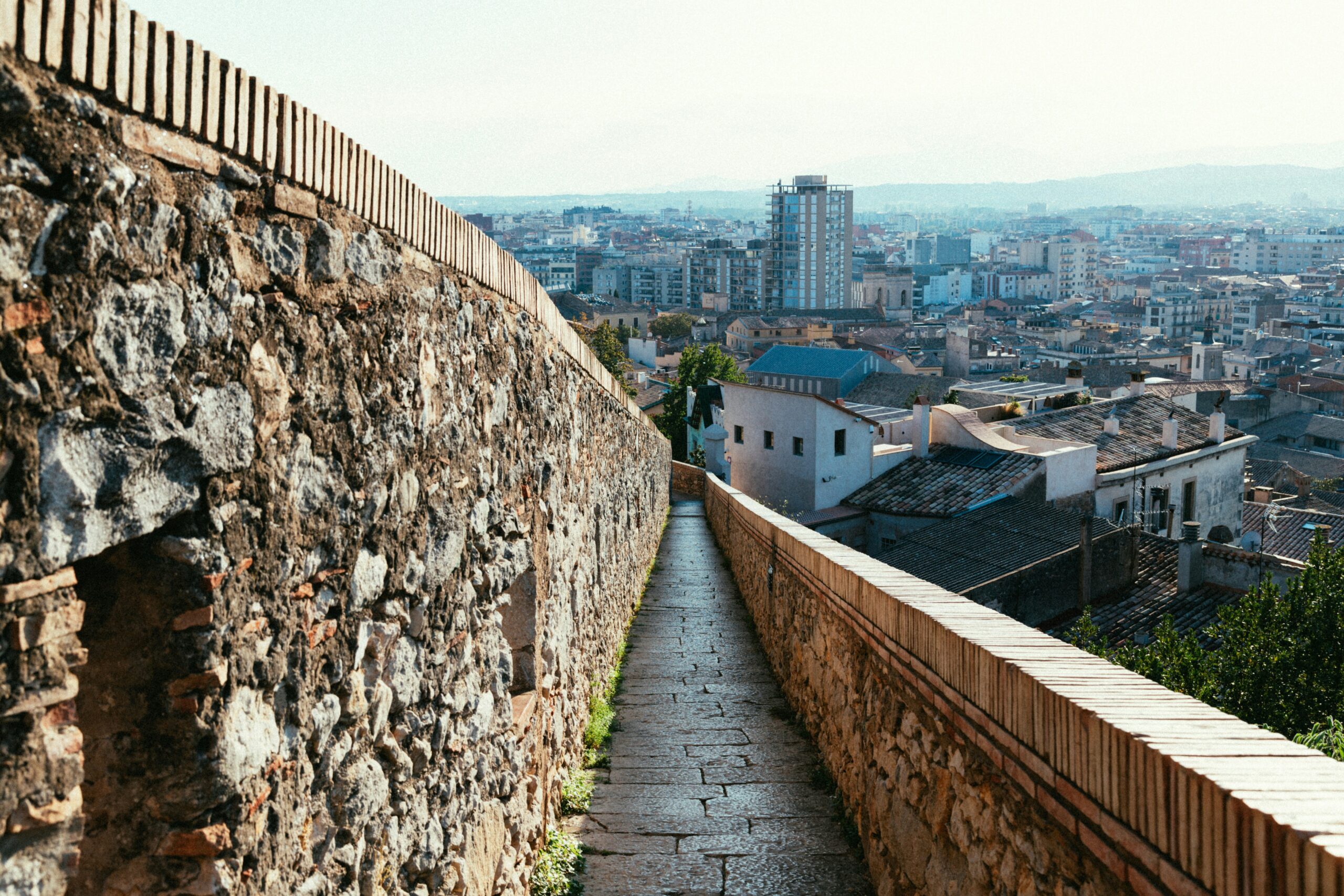 Spanish city street showing urban weather conditions retirees may experience