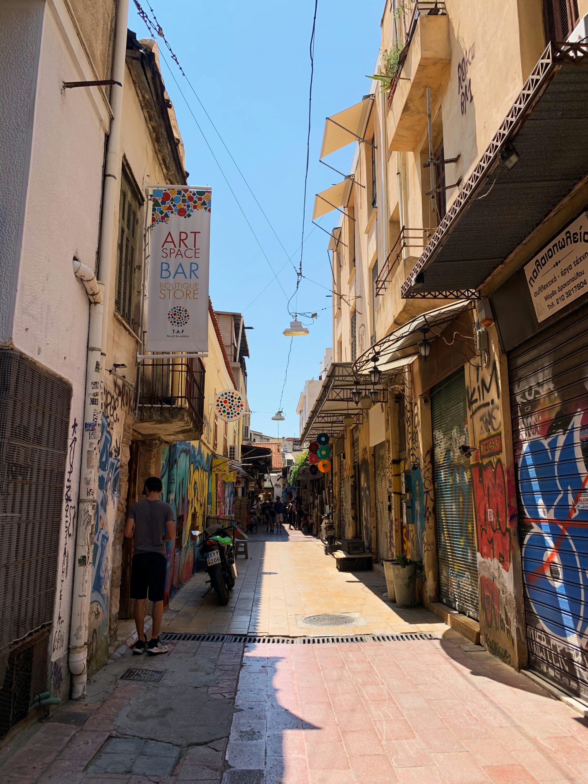 Athens neighbourhood street with apartments, shops and everyday life