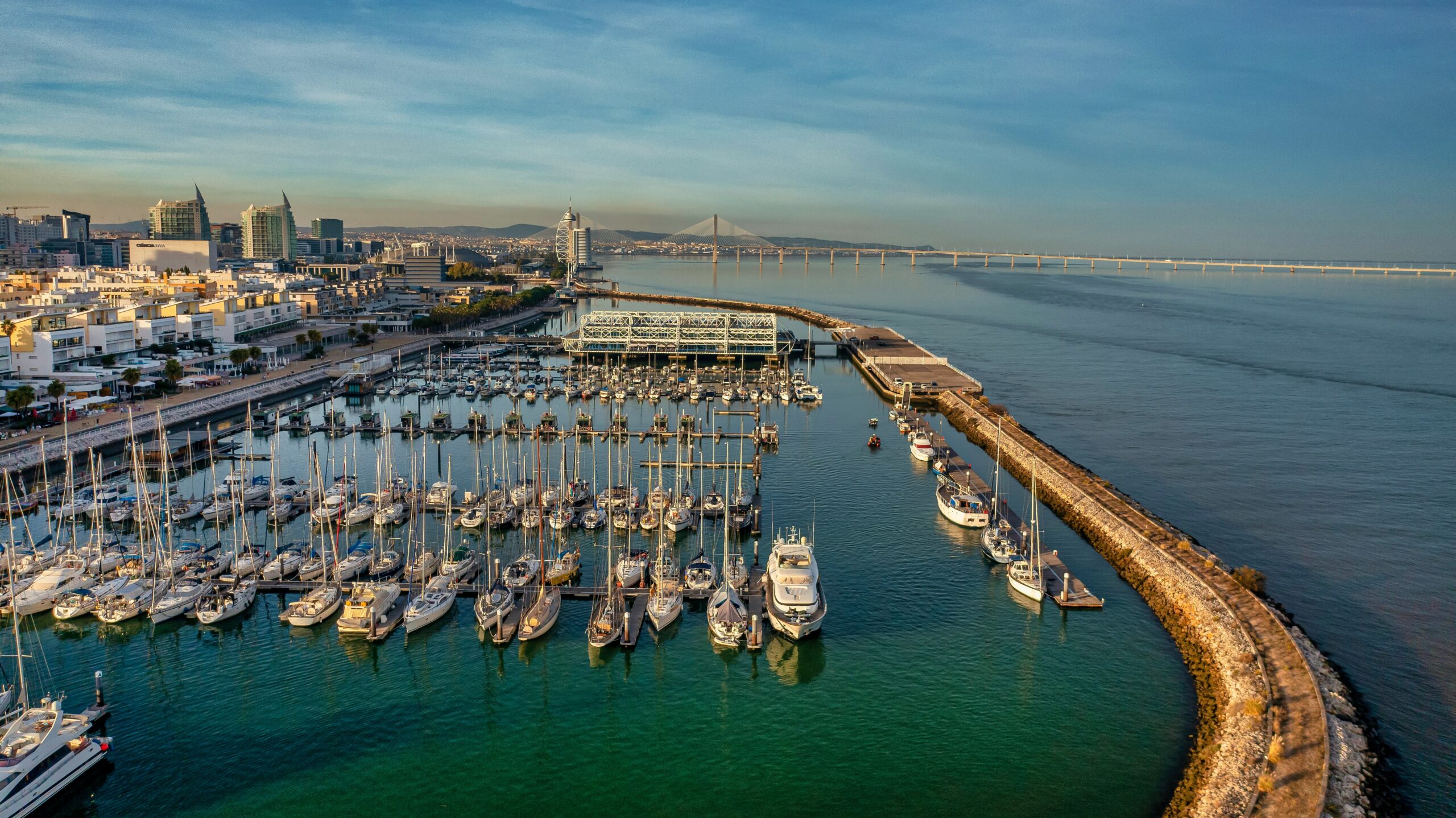 Moving to Portugal guide with Lisbon waterfront and marina view